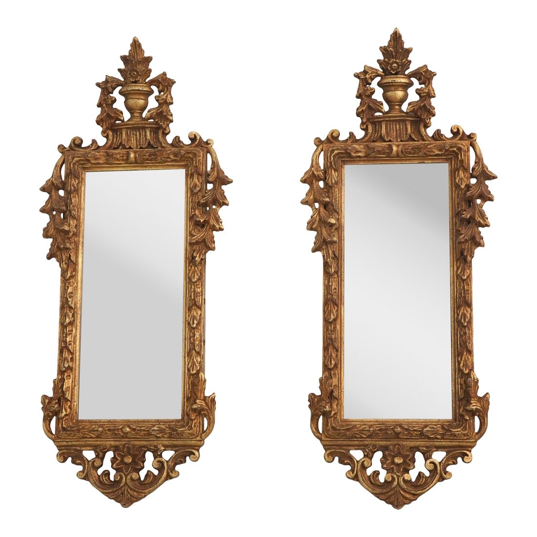 Pair Italian Gilt Wood Gold Finish Decorative Wall Mirrors: Age: Approx: 30 Years Old Details: Nice Gold Gilt Finish Quality Construction French Style Ornate Carved Frames Urn Carved Top Condition: Excellent Original Finish & Condition Size: 14.5w x 2.5d x 34.