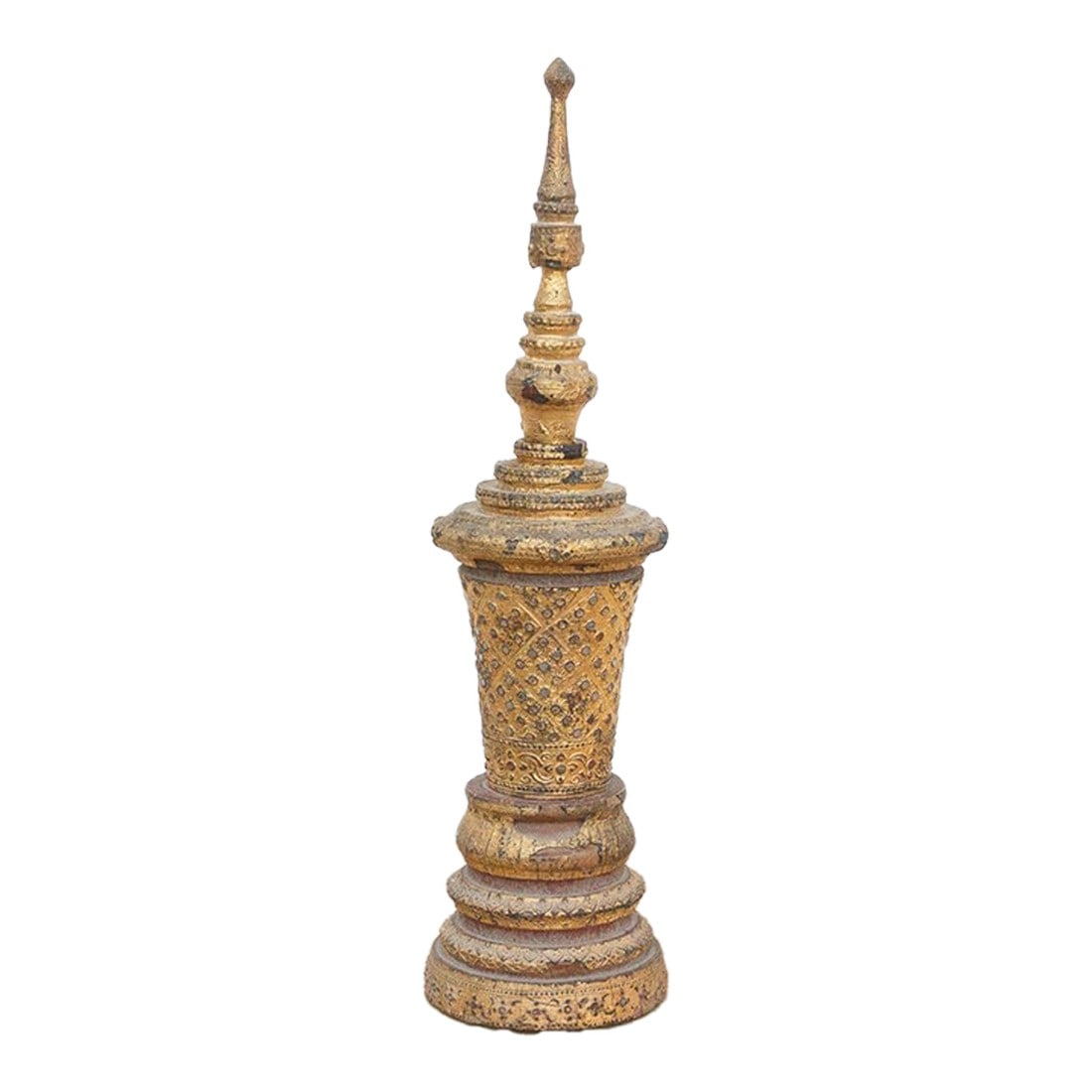 Antique Burmese Giltwood Finial: A relic of devotional art from Myanmar, this slender, towering object mimics the form of a Buddhist stupa or the ornate finial of a Hsun-Ok offering vessel. Crafted from wood and coated in