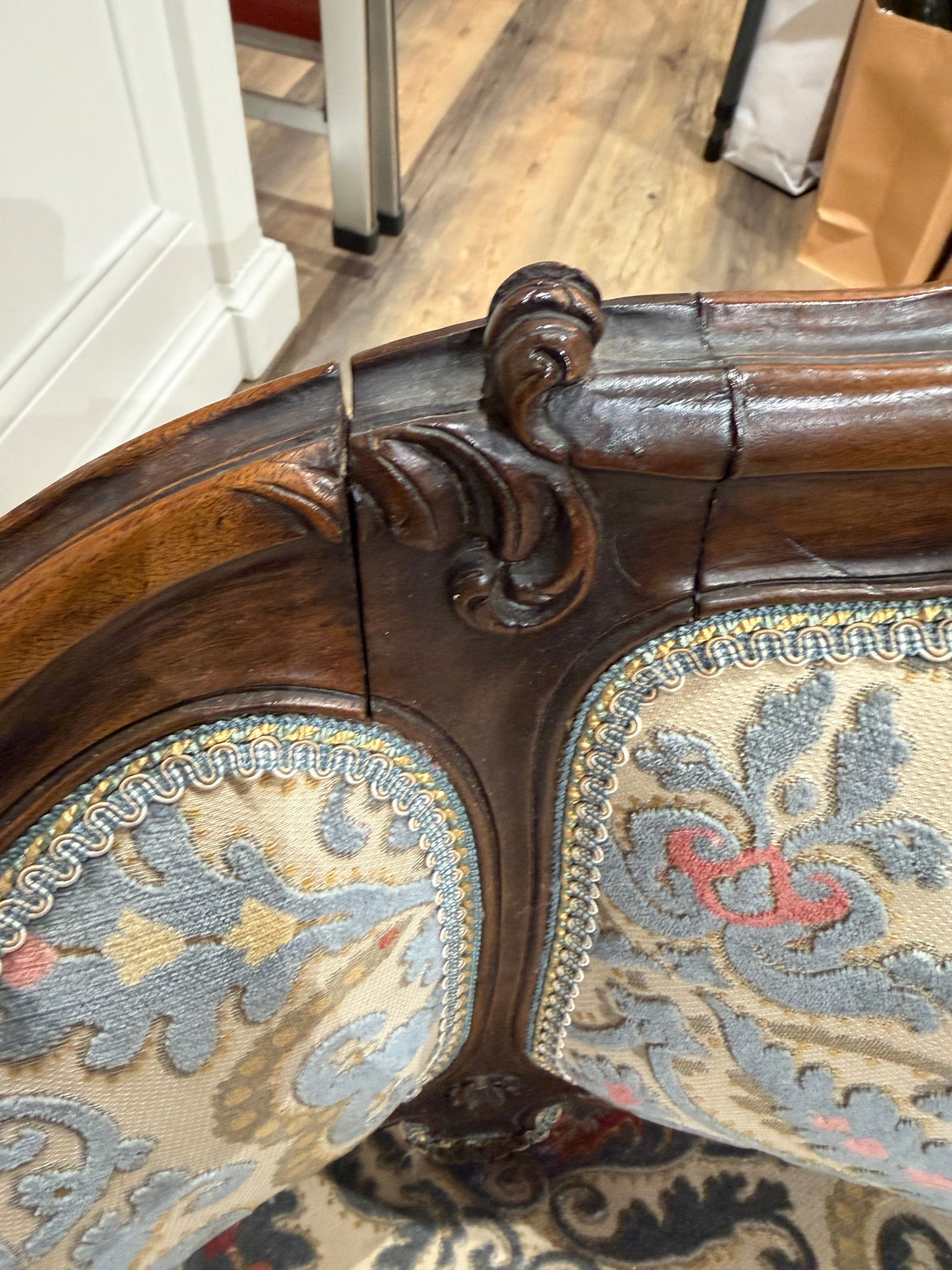 Early 20th Century Petite Needlepoint Bergère Chair With Intricately Carved Walnut Frame - 10