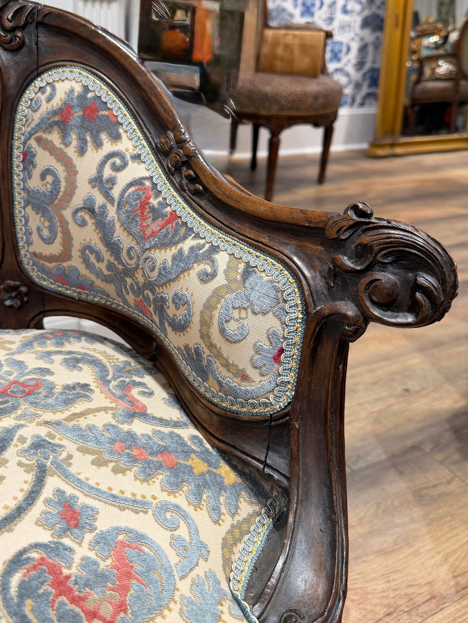Early 20th Century Petite Needlepoint Bergère Chair With Intricately Carved Walnut Frame - 11