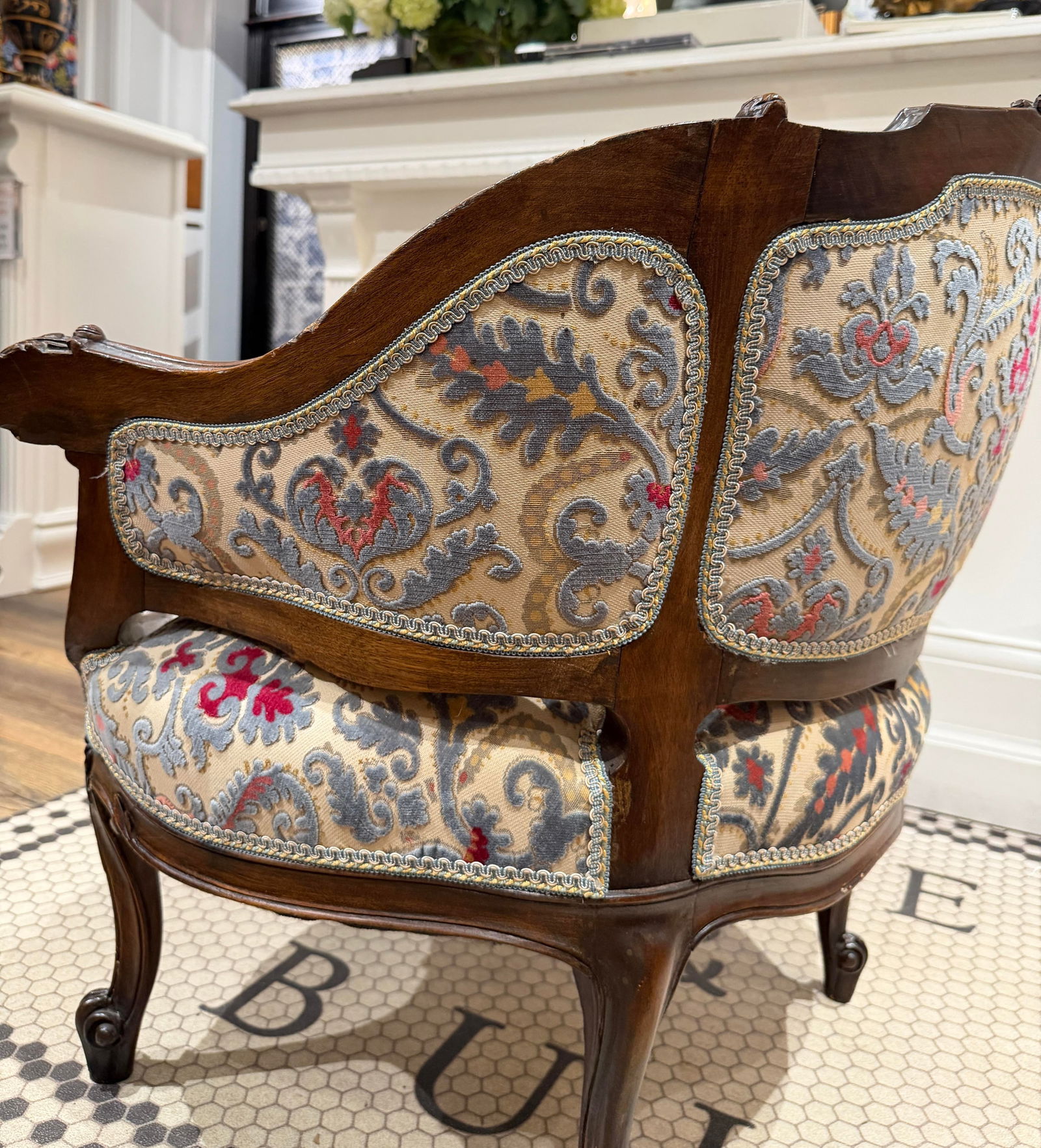 Early 20th Century Petite Needlepoint Bergère Chair With Intricately Carved Walnut Frame - 6