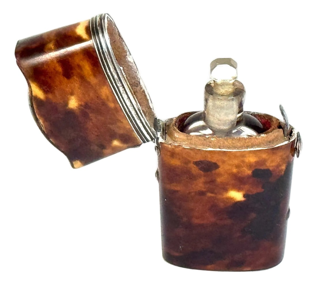 18th Century Tortoiseshell and Silver-Mounted Perfume Etui with Glass Bottle: 18th Century Tortoiseshell and Silver-Mounted Perfume Etui with Glass Bottle England or France, circa 1775–1790 Dimensions: 2.5" H × 1.25" W × 0.5" D A fine late 18th-century