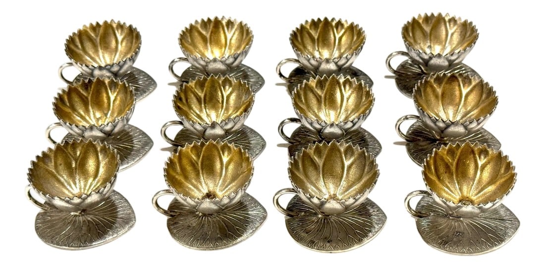 12 American Aesthetic Movement Meriden Silverplate & Goldwashed Lotus Open Salts: Set of 12 American Aesthetic Movement Silverplate & Goldwashed Lotus Open Salts Meriden Britannia Company, circa 1875–1890 Dimensions: 2" W × 1.75" D × 1.5" H (each) Bowl: 1.25"