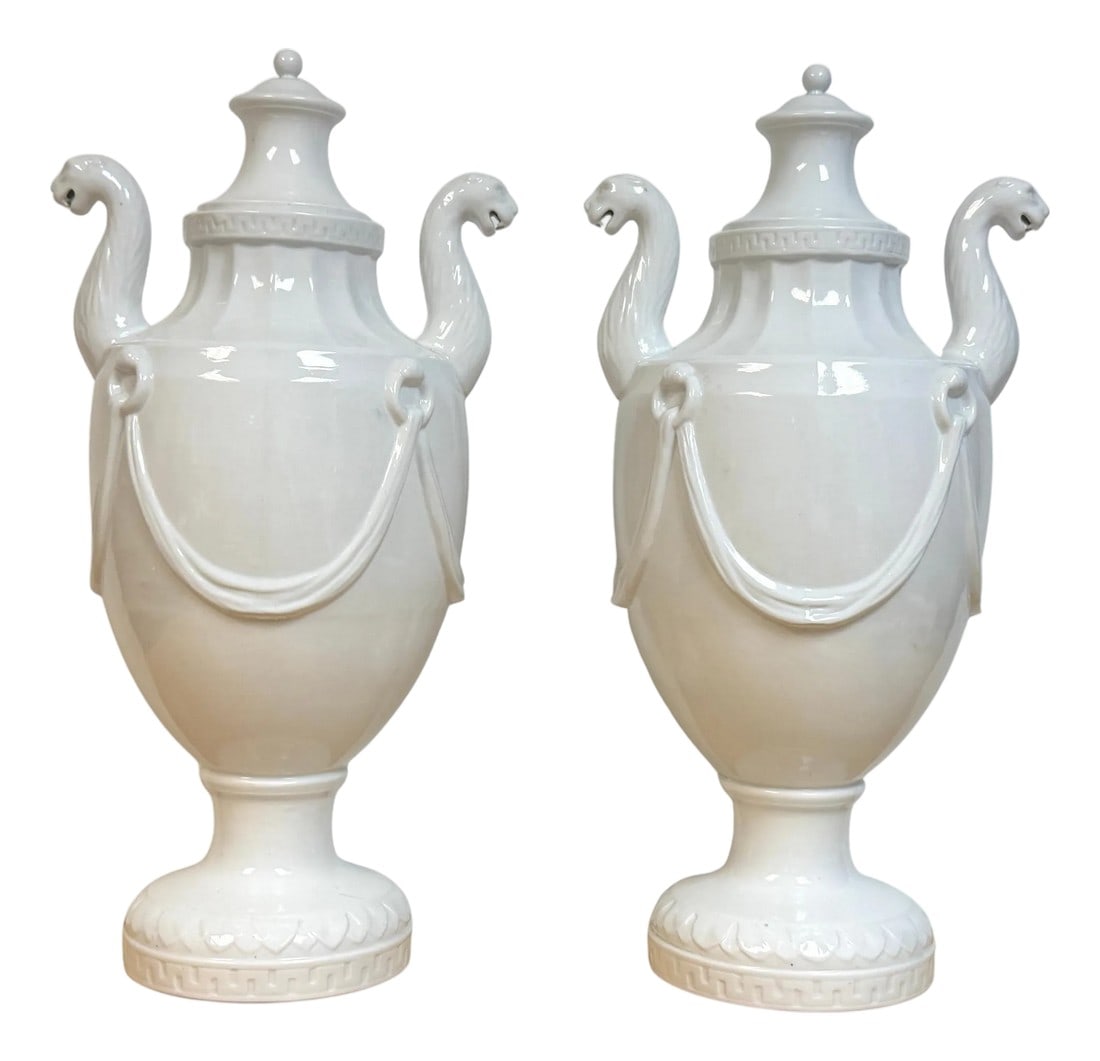 Pair Neoclassical Blanc de Chine Porcelain Urns, Attributed Nymphenburg, 20th C.: Pair of Neoclassical Blanc de Chine Porcelain Covered Urns, Attributed to Nymphenburg, 20th Century Four pieces in set: two lids and two vases Dimensions: 19" H × 10" W (to handles) × 7"
