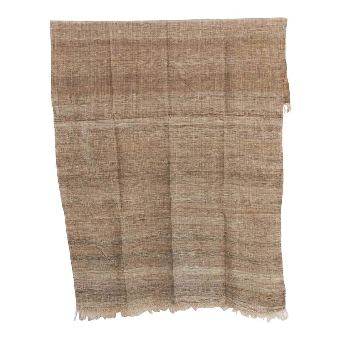 Organic Peace Silk Throw, Brown Clay: The purest expression of the material itself. These throws are crafted from Undyed or Lightly Tinted Eri Silk, celebrating the raw, organic beauty of the fiber. Without heavy dyes to mask it, the hand