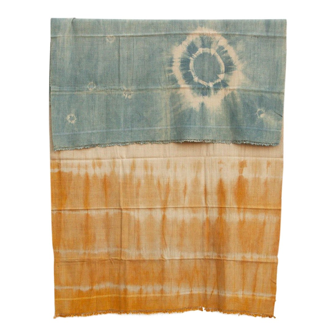 Organic Peace Silk Throw, Indigo Horizon: A masterpiece of natural chemistry and artisan skill. This throw is crafted from Organic Eri Silk in the villages of Assam, known for its incredible durability and softness. The stunning Indigo and Te