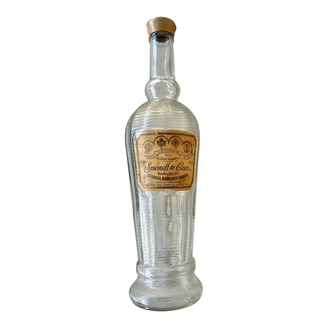 Vintage Glass Replica Bottle Czar Vodka: This is a vintage Smirnoff de Czar Special Reserve Vodka bottle, specifically a replica of the bottles used by the Russian czars. This special edition was produced between 1980 and 1982. It is