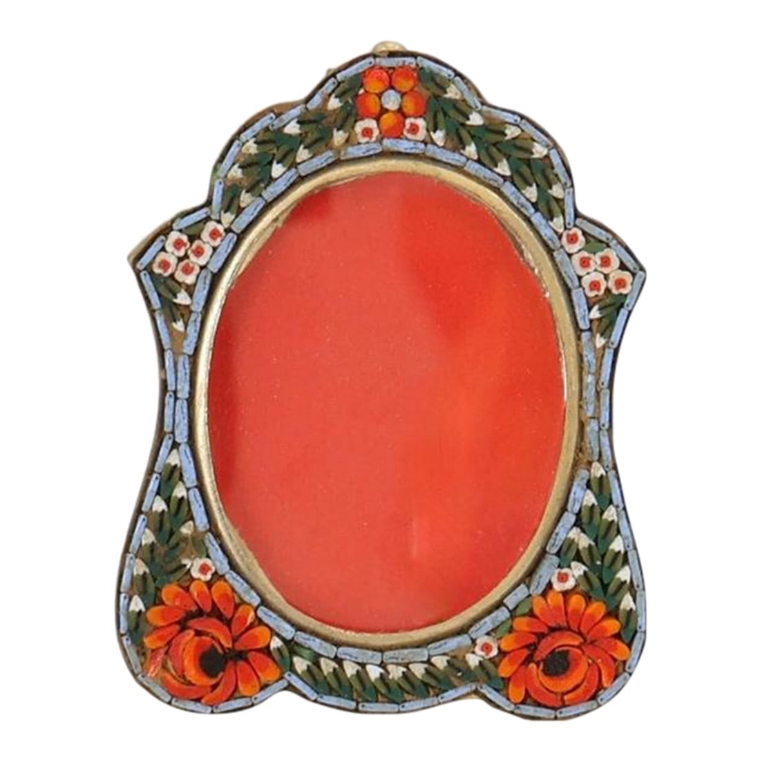 Midcentury Italian Micromosaic Oval Picture Frame: Italian micromosaic picture frame with arched silhouette, decorated with floral glass tesserae surrounding a red glass insert. Mounted in gilt metal. Light wear consistent with age. Discover exquisite