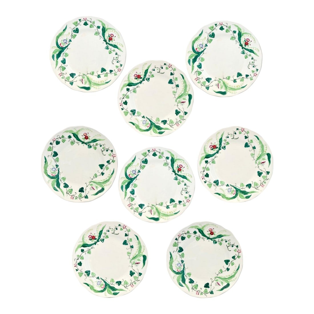 Set of 8 Antique Creil et Montereau Muguet Plates: Extremely rare set of 8 antique Creil et Montereau Muguet Lily of the Valley plates, France, early 19th century. Decorated with hand-painted blossoms and raised relief borders, each piece shows the