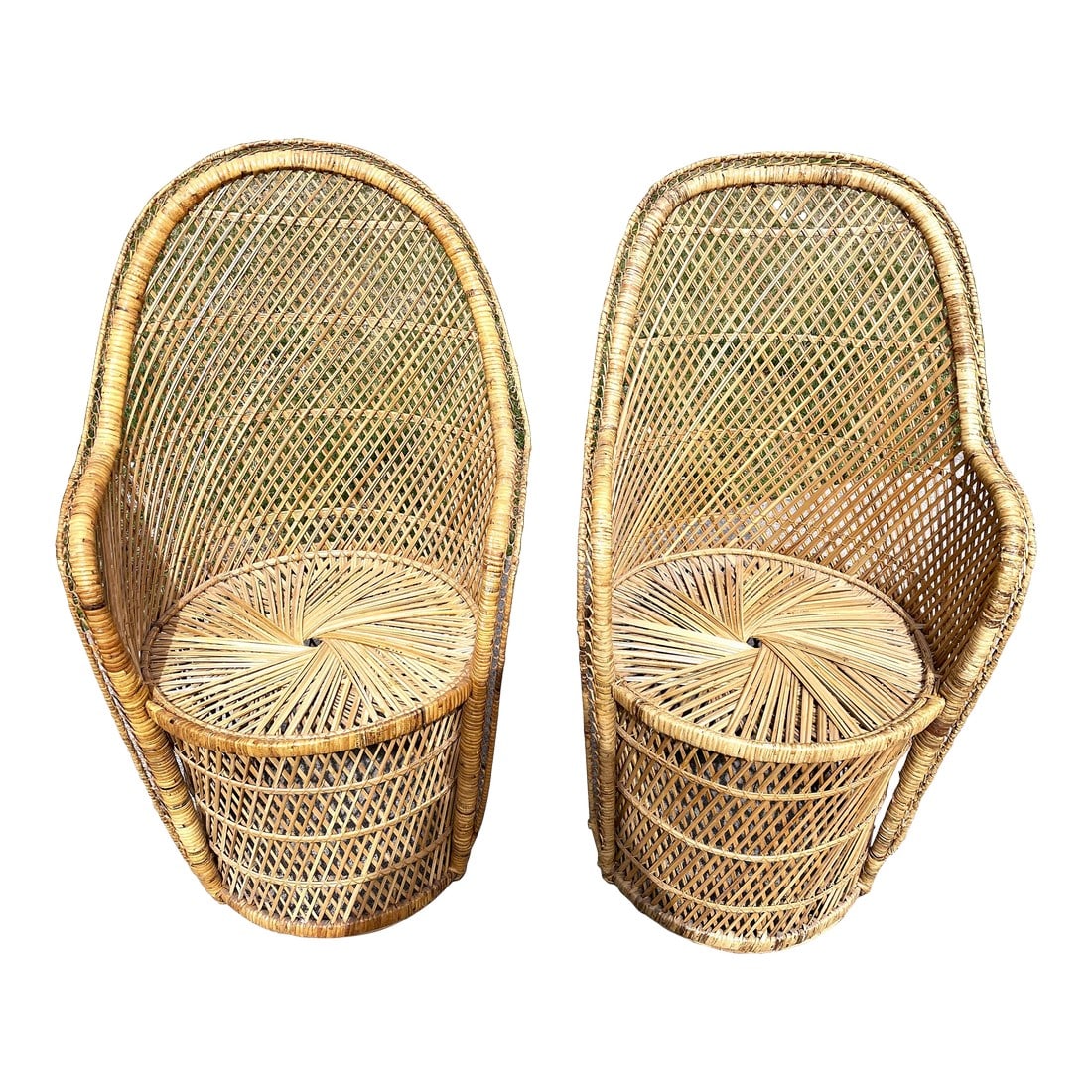 Mid 20th Century Natural Woven Rattan/Wicker Mid Century Barrel Chairs a Pair: This is a wonderful boho chic pair of rattan chairs with natural wicker woven in a conventional cross hatch pattern. The chair bottoms are round like barrels and the tops are a flared barrel shape. I