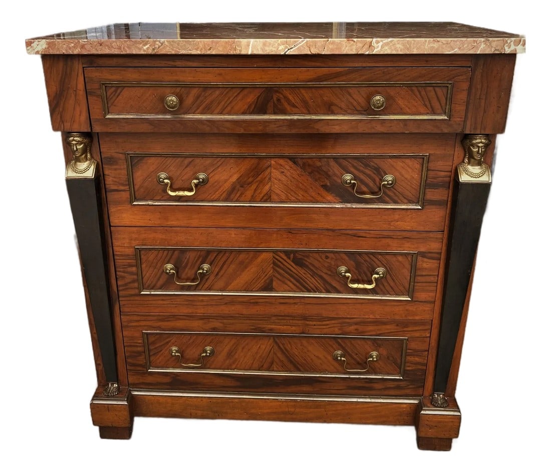 Mid 20th Century French Empire Style Commode Caryatid Bronze Figural Columns & Pink Marble: This is an adorable petite commode with wonderful grained veneer and blackened flat columns on the sides which have a bronze woman's head on the top and bronze feet on the bottom. It was made in