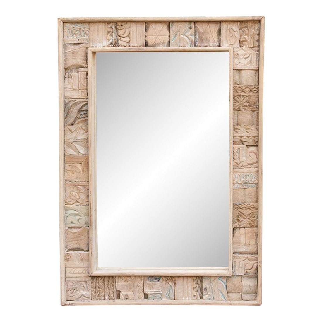 Bleached Carved Wood Mosaic Mirror: This mirror is a piece of history, re-imagined. Designed and hand-assembled by our de-cor team, it gives a second life to a collection of vintage architectural carvings that might otherwise have been