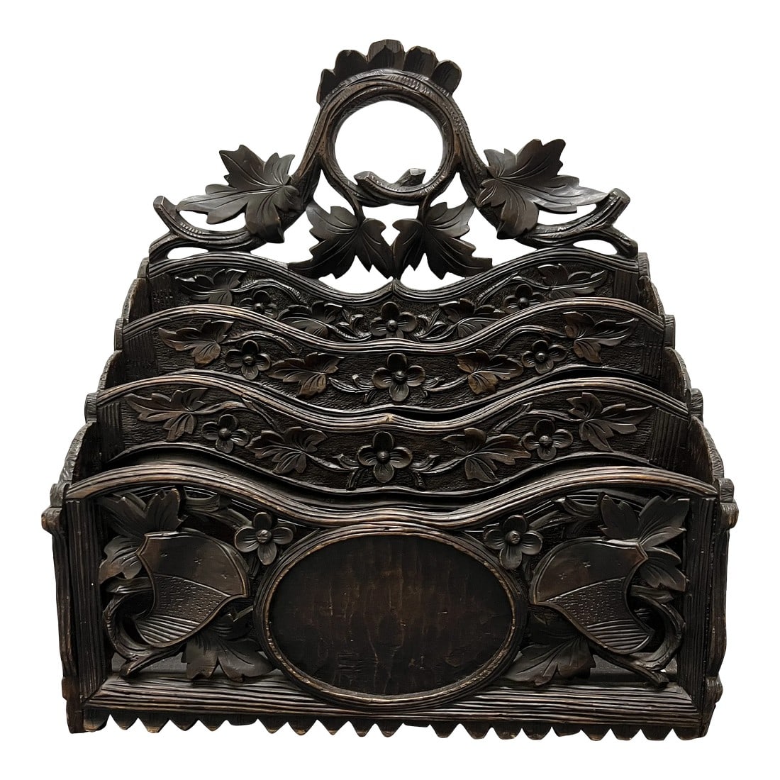 19th Century Antique German or Swiss Black Forest Hand Carved 3 Section Foliate Canterbury With Hand: Done by a great artisan, great craftsmanship. Condition: Alterations: Original Condition Unaltered Imperfections: Some Imperfections Condition Notes: Front feet appear to be slightly shorter.