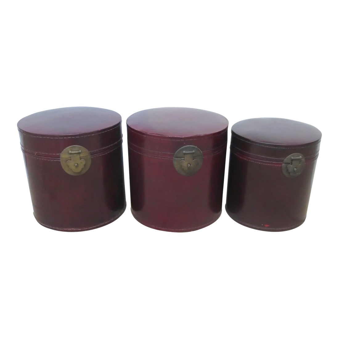 Antique Chinese Leather Luggage Boxes - Set of 3: Set of three leather cylinder storage trunks. Chinese deco designs with oxblood deep maroon polished leather and Chinese Bronze hardware to lock closed.Great pair of Chinese leather canisters for