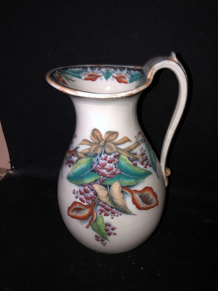 14” Calla Mulberry Pitcher: It is 14” high and is marked. It has no chips, cracks or repairs Shipping: Domestic: Flat-rate of $30.00 to anywhere within the contiguous U.S. International: Foreign shipping rates are determin