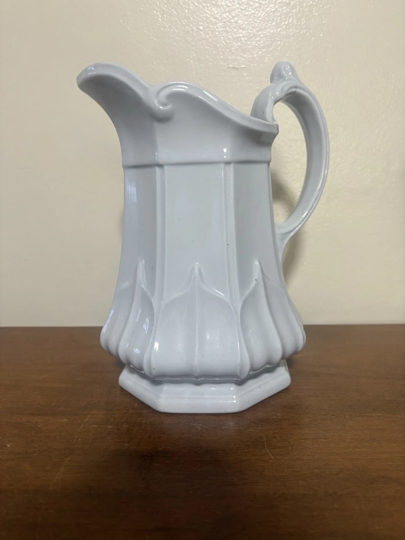 Antique Ironstone Sydenham Pitcher: It is 9 3/4” high and is marked. It has a tiny flake on the underside of the bottom rim. Otherwise it has no other issues Shipping:Domestic: Flat-rate of $15.00 to anywhere within the
