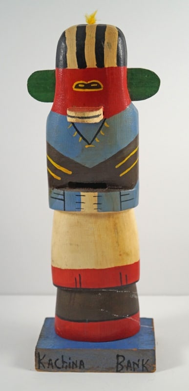 Totem Pole Doll Wooden Antique Still Bank #3: Title: Totem Pole Doll Wooden Antique Still Bank #3Dimension: 12 1/4” tall x 4 7/8” wide x 3” deepDate: Ca. 1940’s – early 50’s.Additional Information: Exceptional