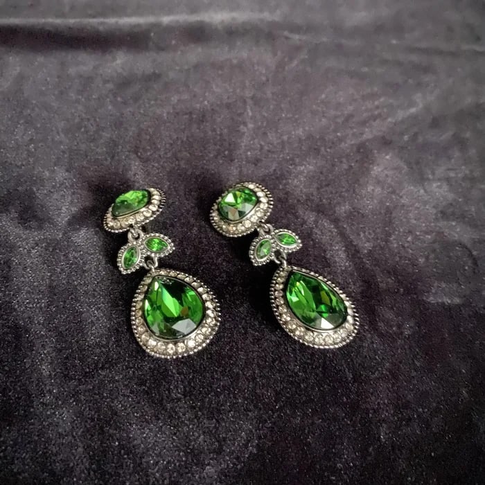 Retired Brighton Raindrops Clip Earrings: Elegant retired clip-on earrings from Brighton's 'Raindrops' collection, featuring a silver-tone hammered finish. Shipping:Domestic: Flat-rate of $11.00 to anywhere within the contiguous