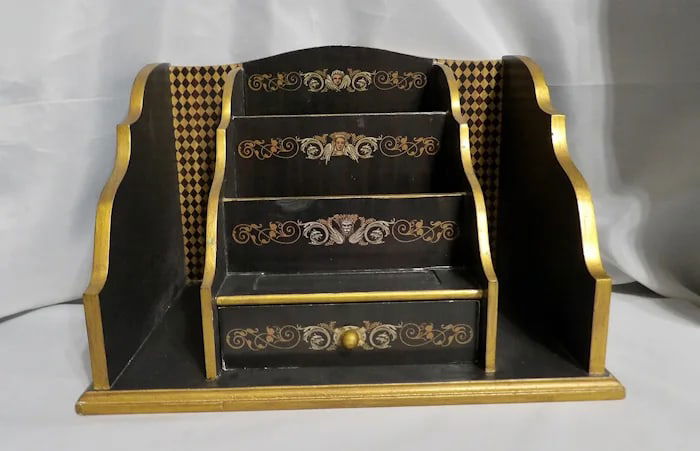 Vintage Ornate Desk Organizer Drawer: Elegant vintage wooden desk organizer featuring ornate gold-tone metal hardware and a single storage drawer. Shipping:Domestic: Flat-rate of $22.00 to anywhere within the contiguous