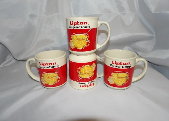 Set 4 Vintage Lipton Cup-A-Soup Mugs: Set of four collectible vintage ceramic mugs with the classic red and white Lipton Cup-A-Soup advertising graphics. Shipping:Domestic: Flat-rate of $19.00 to anywhere within the contiguous