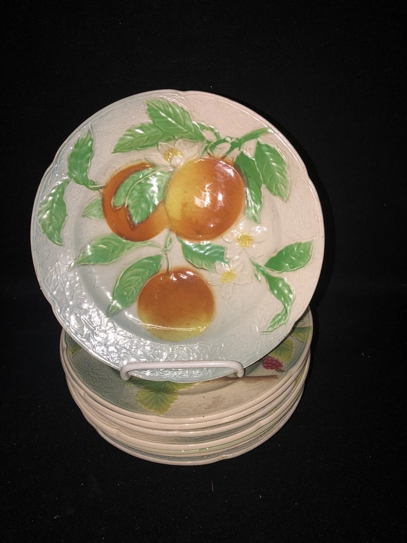 8 Majolica 8 5/8” Fruit Plates: For sale are 8 majolica plates that measure 8 5/8” and are marked. One plate has a flake on the rim. Otherwise they have no other issues Shipping:Domestic: Flat-rate of $20.00 to anywhere
