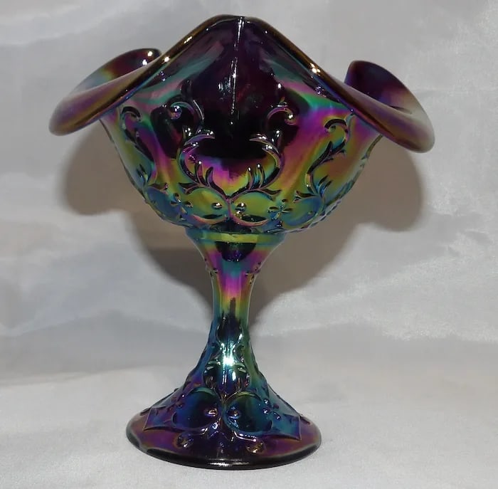 Fenton Amethyst Spanish Lace Carnival Glass Bowl: Vintage Fenton amethyst glass bowl in the Spanish Lace pattern, featuring an iridescent carnival glass finish and ruffled rim. Shipping:Domestic: Flat-rate of $18.00 to anywhere within the