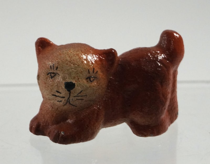 Antique Playful Kitten Cat Cast Iron Paperweight #2: Title: Antique Playful Kitten Cat Cast Iron Paperweight #2Dimension: 1” tall x 1 1/2” longDate: Ca. 1940’s-50’s.Additional Information: Full-figure, solid casting cast iron