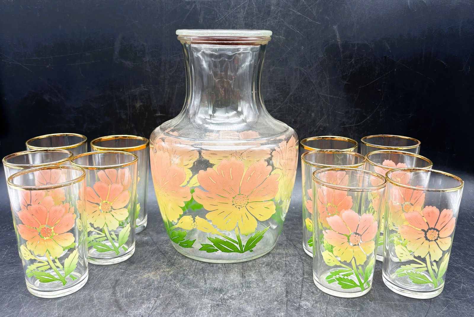 Vintage Anchor Hocking juice set PINK YELLOW daffodils CARAFE glass LID: Date/Period: Approx 1950's Dimension: Pitcher is 8" tall, glasses are approx. 4" tall Material: glass Additional Information: Vintage Anchor Hocking juice set PINK YELLOW daffodils CARAFE glass LID Sh