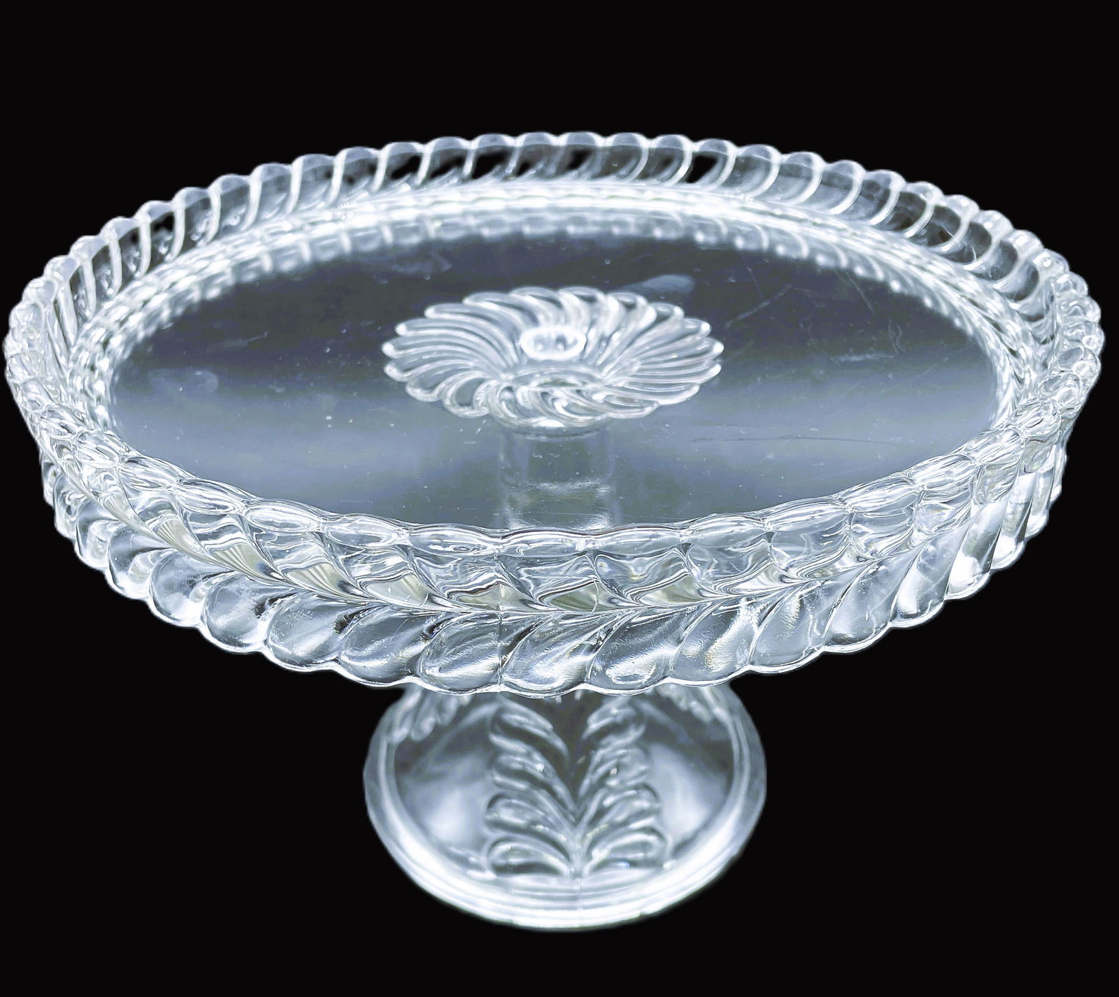 Antique EAPG pattern glass ADAMS & CO. Feather PLUME PEDESTAL CAKE STAND: Date/Period: 1874-1890Dimension: APPROX 9.5" DIAMETER X 6" TALLMaterial: GLASSAdditional Information: EAPG ADAMS AND COMPANY PEDESTAL CAKE PLATE STAND SALVER PLUME PATTERN WITH RUM WELL 1874-1890 