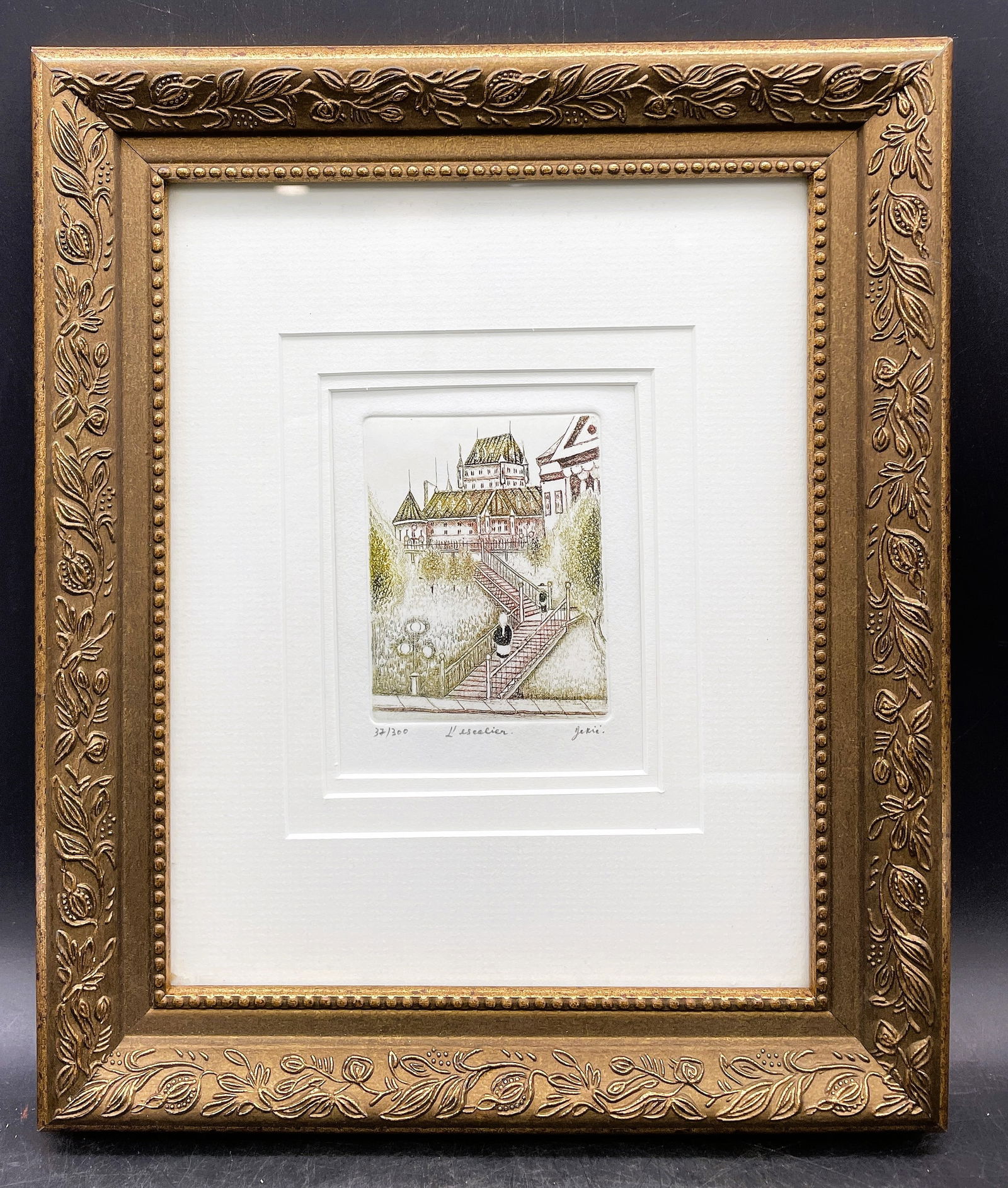 Vintage Signed & Numbered L'ESCALIERS Quebec Print 32/300: Date/Period: unknownDimension: framed size 10.5 x 12.5Material: mixed materialsAdditional Information: Vintage Signed & Numbered L'ESCALIERS Quebec Print Shipping:Domestic: Flat-rate of $16.00 to