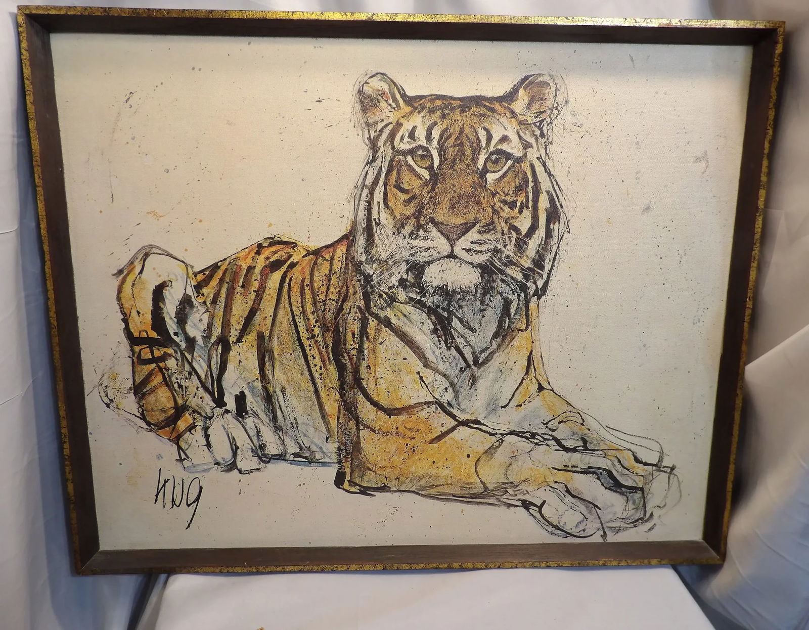 Vintage Fritz Hug Resting Tiger Framed Print on Canvas: This vintage print features a resting tiger by artist Fritz Hug. It is in excellent condition with no loss of color, set in a shadow box frame measuring 28 ¾” x 23”. 