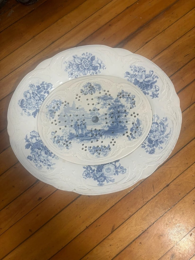 Rare Staffordshire Platter W/ Stainer Insert: The platter measures 18 5/8” x 16 1/8” and is marked. It has very minor surface wear in several small spots. The strainer measures 12 5/8” x 10” and is marked. It has two