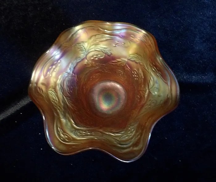 Fenton 1930 Holly Berry Ruffled Marigold Bowl: A classic 1930s Fenton carnival glass bowl in marigold with the Holly Berry pattern and a ruffled edge. Shipping: Domestic: Flat-rate of $18.00 to anywhere within the contiguous U.S. International: Fo