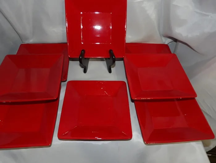 Waechtersbach Fun Factory Red Cherry Set: Vibrant red ceramic set from Waechtersbach's Fun Factory line, including plates and bowls with a glossy cherry finish. Shipping: Domestic: Flat-rate of $24.00 to anywhere within the contiguous U.S. In