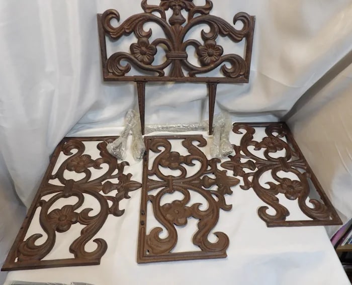 Cast Iron Garden Fence Spikes Relax: Set of decorative cast iron garden fence spikes, one featuring a 'Relax' sign, perfect for adding vintage charm to outdoor spaces. Shipping:Domestic: Flat-rate of $45.00 to anywhere within the