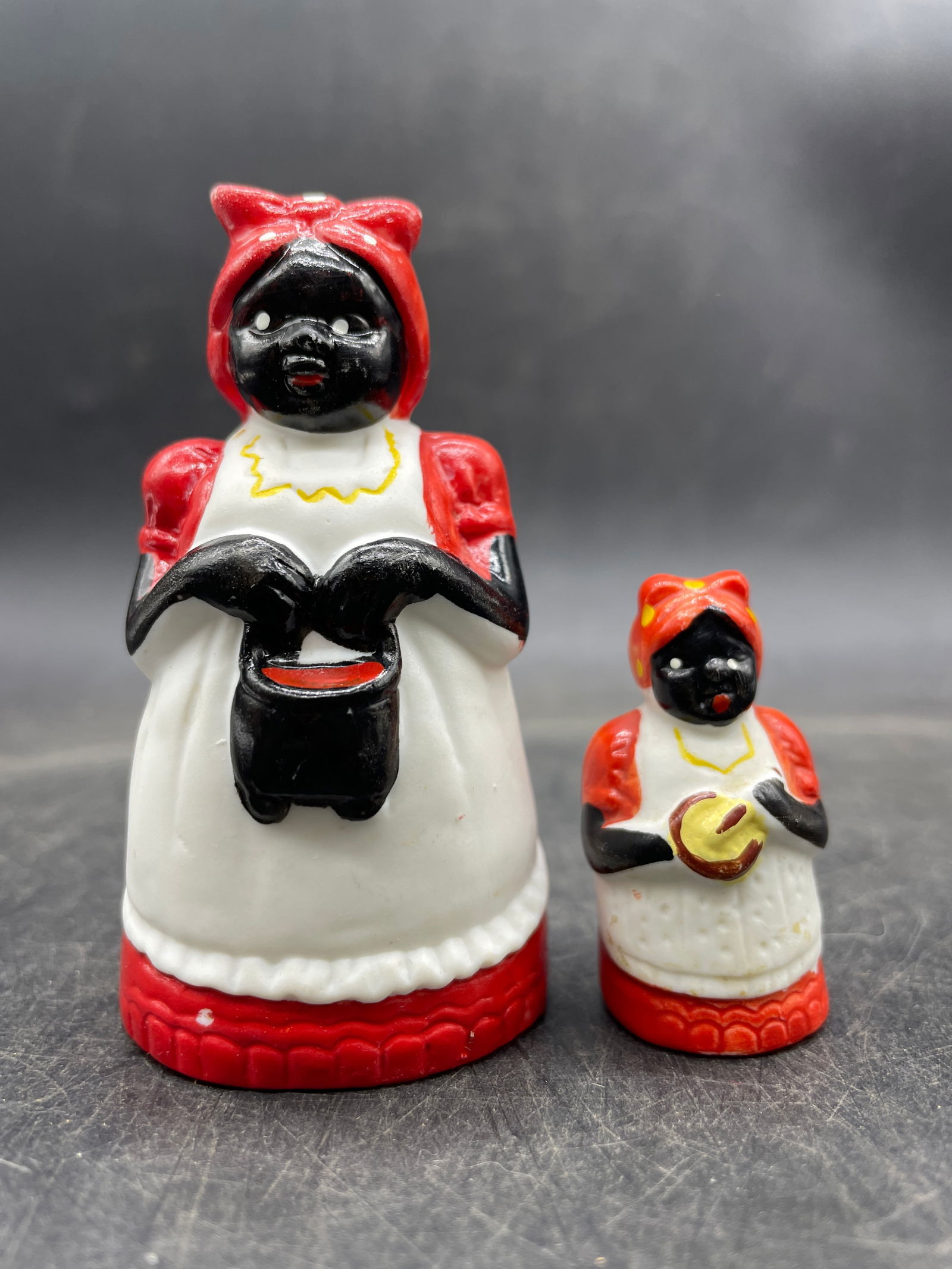 Pair of Bisque Mammy Figures: Date/Period: unknown Dimension: Approx. 3" x 1.5" and 1.5" x .75" Material: bisque Additional Information: Pair of Bisque Mammy Figures Shipping: Domestic: Flat-rate of $9.00 to anywhere within the co