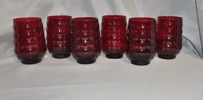 Anchor Hocking Royal Ruby Bubble Berry Bowls: Set of vintage Anchor Hocking Royal Ruby glass berry bowls in the 'Bubble' pattern with a deep red finish. Shipping: Domestic: Flat-rate of $19.00 to anywhere within the contiguous U.S. International: