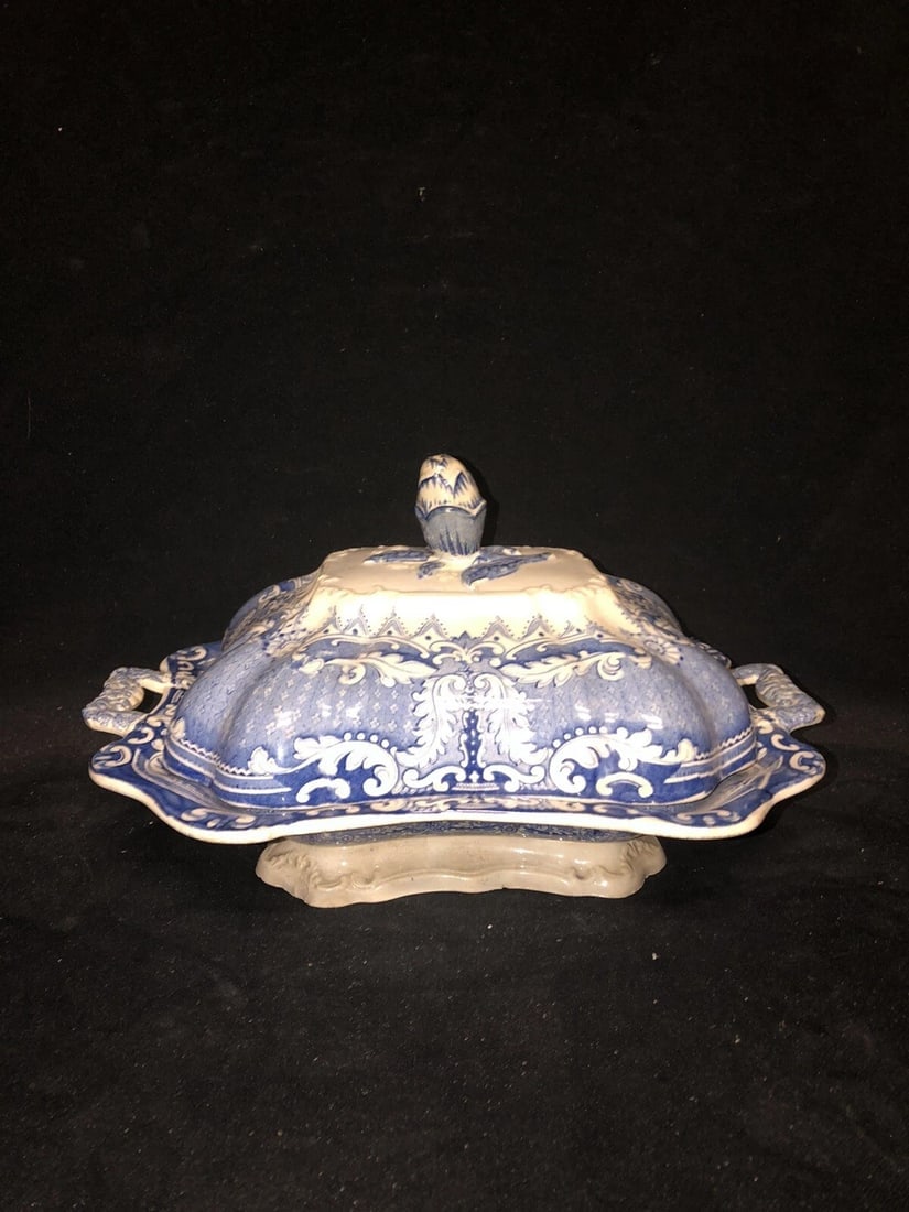 Staffordshire Covered Vegetable: It measures 12 3/8” x 9 3/4” x 6” and dates around the 1830’s. It has 3 shallow chips on the base rim and 6 flakes on the underside of the base rim. Otherwise it has no other