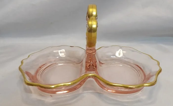 Pink Depression Glass Relish Mint Dish: Vintage pink depression glass relish or mint dish, featuring a divided section and delicate molded handles. Shipping:Domestic: Flat-rate of $18.00 to anywhere within the contiguous
