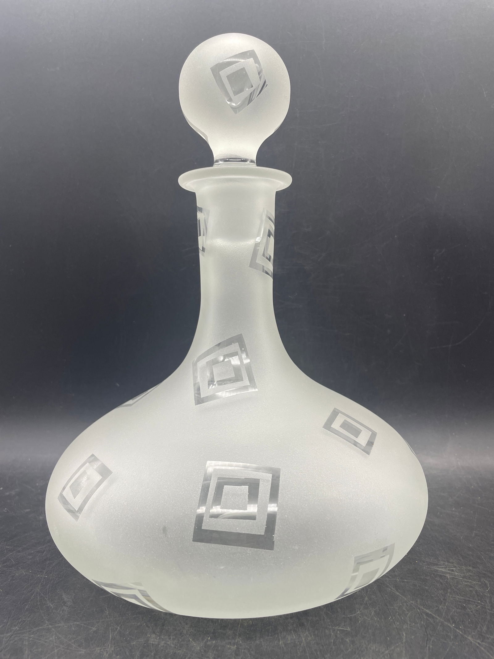 Art Glass Decanter Robert McCandless Signed, Etched Frosted Geometric Pattern: Date/Period: unknownDimension: Approx. 11" tall x 8" diameterMaterial: glassAdditional Information: Art Glass Decanter Robert McCandless Signed Etched Frosted Genie Geometric Large Heavy 
