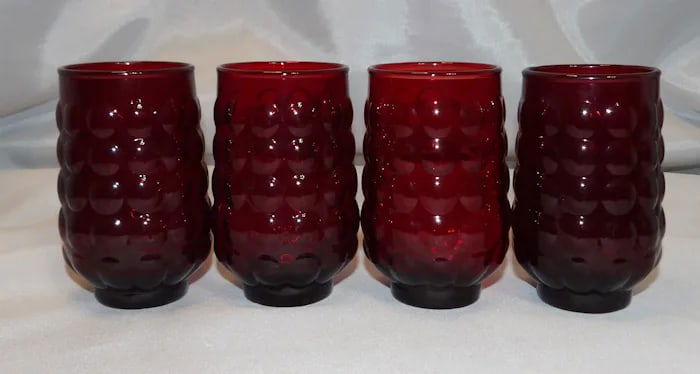 Anchor Hocking Royal Ruby Bubble Luncheon Plates: Set of vintage luncheon plates in Royal Ruby glass by Anchor Hocking, featuring the textured bubble rim design. Shipping: Domestic: Flat-rate of $18.00 to anywhere within the contiguous U.S. Internati