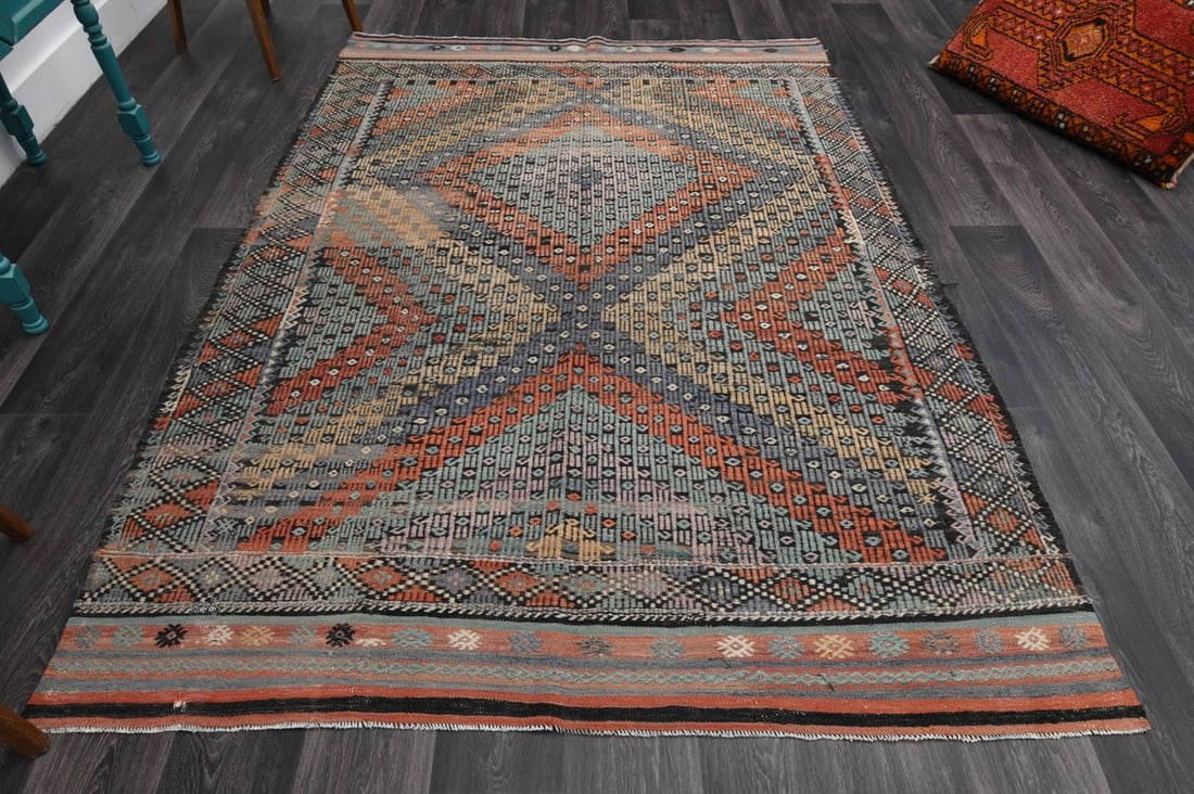 5.8x8.5 ft, TURKISH Flatweave Kilim Rug: Title: 5.8x8.5 ft, TURKISH Flatweave Kilim Rug Origin: Turkey Date/Period: 1960 - 1970 Materials: Wool and Cotton Size: Width: 5.5 feet; Length: 8.8 feet Description: This Turkish one-of-a-kind