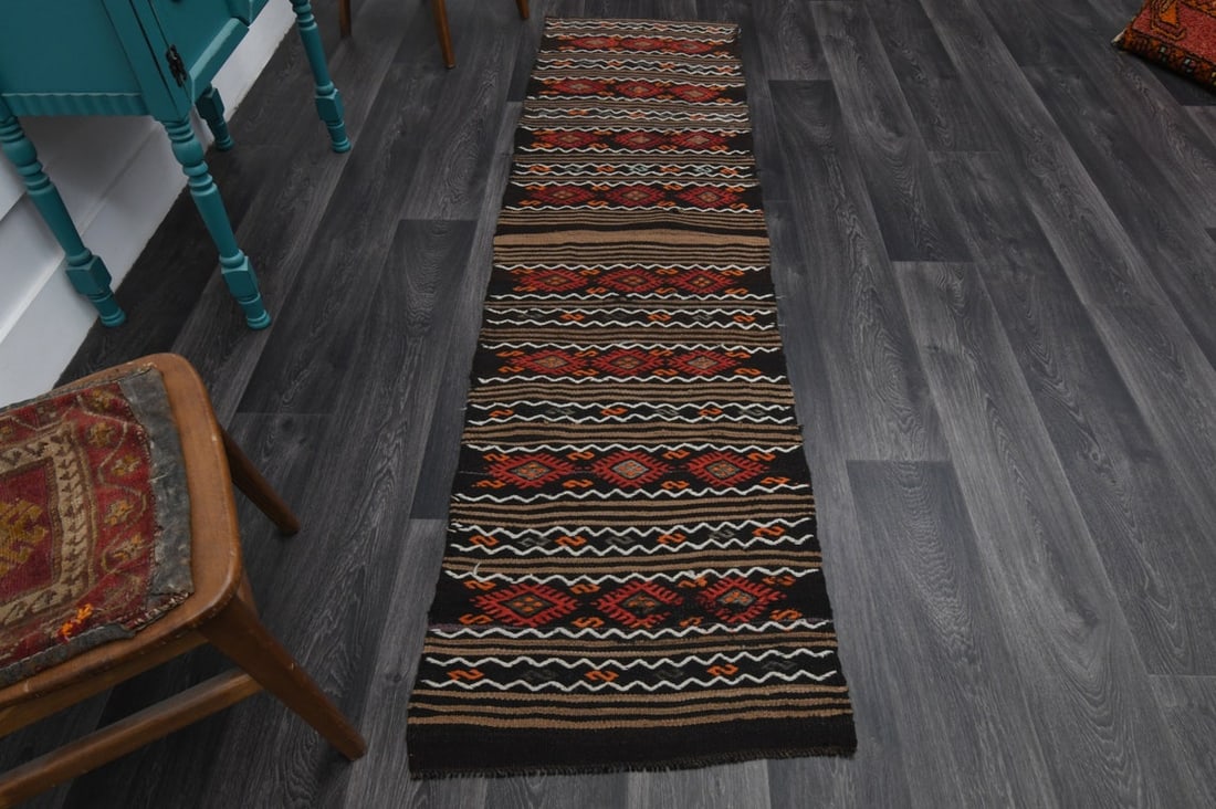 2.2x8.2 ft, TURKISH KILIM Runner: Title: 2.2x8.2 ft, TURKISH KILIM Runner Origin: Turkey Date/Period: 1960 - 1970 Materials: Wool and Cotton Size: Width: 2.2 feet; Length: 8.2 feet Description: This Turkish one-of-a-kind Vintage