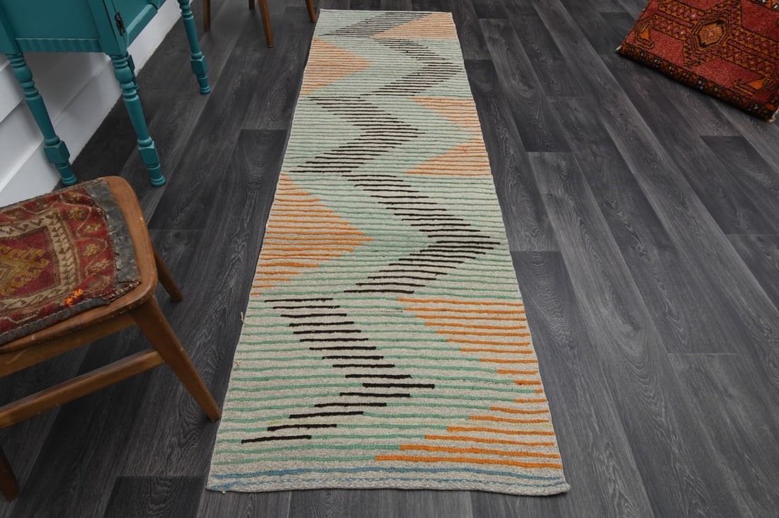 2.7x9.7 ft, TURKISH KILIM Runner: Title: 2.7x9.7 ft, TURKISH KILIM Runner Origin: Turkey Date/Period: 1960 - 1970 Materials: Wool and Cotton Size: Width: 2.7 feet; Length: 9.7 feet Description: This Turkish one-of-a-kind Vintage