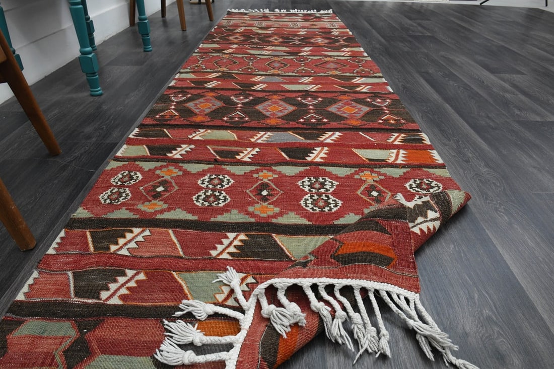 3x11 FLATWEAVE TURKISH VINTAGE Rug: Title: 3x11 FLATWEAVE TURKISH VINTAGE Rug Origin: Turkey Date/Period: 1960 - 1970 Materials: Wool and Cotton Size: Width: 3.3 feet; Length: 11.2 feet Description: This Turkish one-of-a-kind Vintage