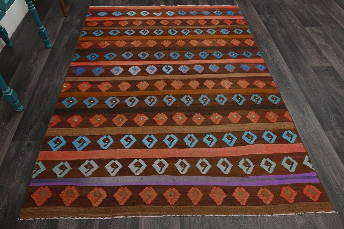 5x7 ft, TURKISH KILIM Rug: Title: 5x7 ft, TURKISH KILIM Rug Origin: Turkey Date/Period: 1960 - 1970 Materials: Wool and Cotton Size: Width: 5.3 feet; Length: 7.2 feet Description: This Turkish one-of-a-kind Vintage Flatweave