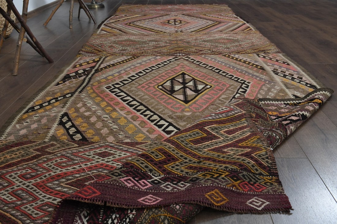 4'6x13 ft, EARTH TONE KILIM: Title: 4'6x13 ft, EARTH TONE KILIM Origin: Turkey Date/Period: 1960 - 1970 Materials: Wool and Cotton Size: Width: 4.6 feet; Length: 13 feet Description: This Turkish one-of-a-kind Vintage Flatweave