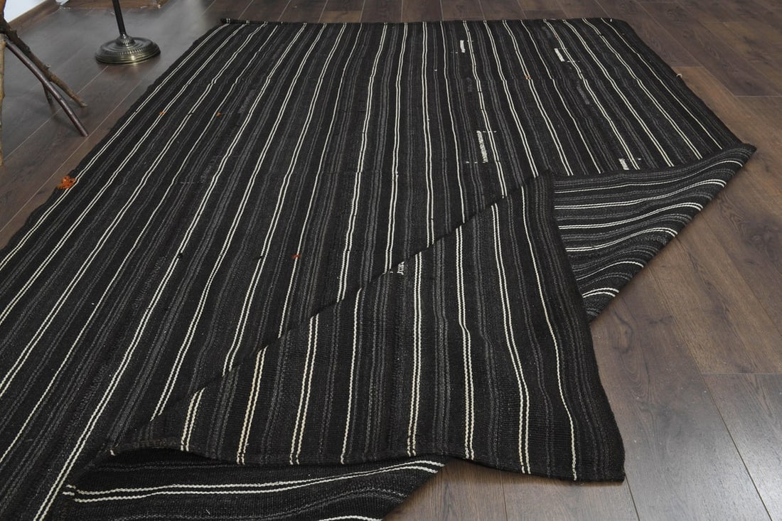 6'3x9.7 ft, BLACK KILIM RUG: Title: 6'3x9.7 ft, BLACK KILIM RUG Origin: Turkey Date/Period: 1960 - 1970 Materials: Wool and Cotton Size: Width: 6.3 feet; Length: 9.7 feet Description: This Turkish one-of-a-kind Vintage Flatweave