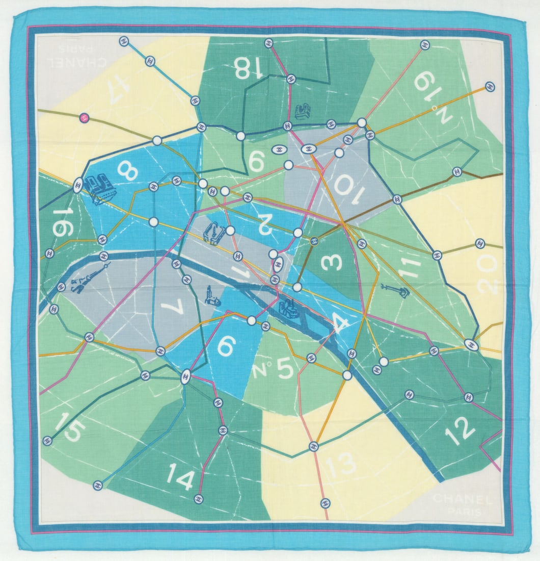 Chanel cotton voile pochette with Paris arrondissements & Métropolitan map c1971: Chanel Paris [arrondissement and metro map]. The garment is undated, but can be dated as having been manufactured between 1970 and 1975 by reference to information on the printed map. The 5e and 19e