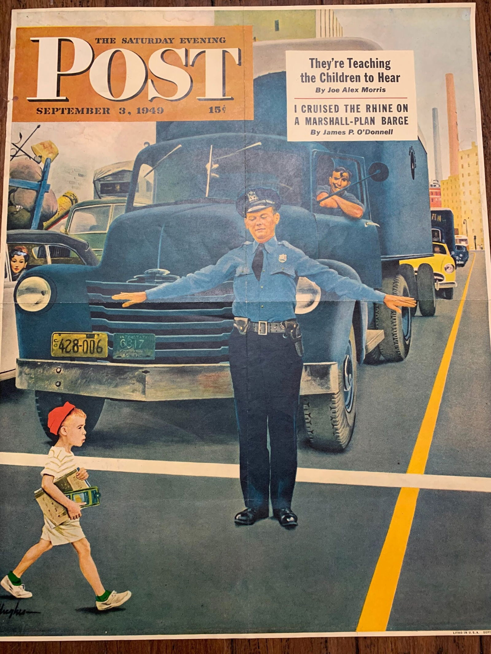 22x28 1949 Newstand Poster Saturday Evening Post - Art By George Hughes traffic Cop: 22x28 1949 Newstand Poster Saturday Evening Post - Art By George Hughes traffic Cop Please refer to the attached photos to determine the condition of this original vintage item. Note: LB means Linen
